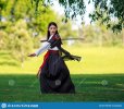 young-asian-woman-traditional-kimono-trains-fighting-techniques-katana-sword-samurai-warrior-g...jpg