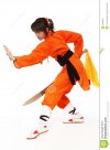 girl-wushu-orange-costume-low-guard-carries-out-complex-martial-arts-31048027.jpg