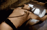 1594-bound-topless-women-has-her-nipples-shocked-by-electro-torture.gif