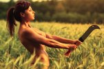 0-young-naked-woman-machete-outdoors-portrait-42830804.jpg