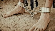 legs-prisoner-chains-closeup-footage-076362308_prevstill.jpeg