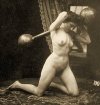 Unknown_-_Female_Nude_exercising_with_a_Globe_Barbell_c1900_(sepia_photo)_-_(MeisterDrucke-636...jpg