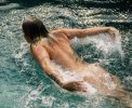 0-naked-woman-swimming-in-swimming-pool-panoramic-images.jpg