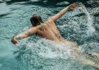 0-naked-woman-swimming-in-swimming-pool-panoramic-images.jpg