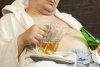 16192691-drunk-man-asleep-with-a-beer-in-the-hands-of.jpg