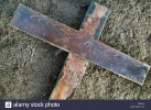 wooden-cross-laying-on-the-ground-with-three-nails-nearby-FR9A14.jpg